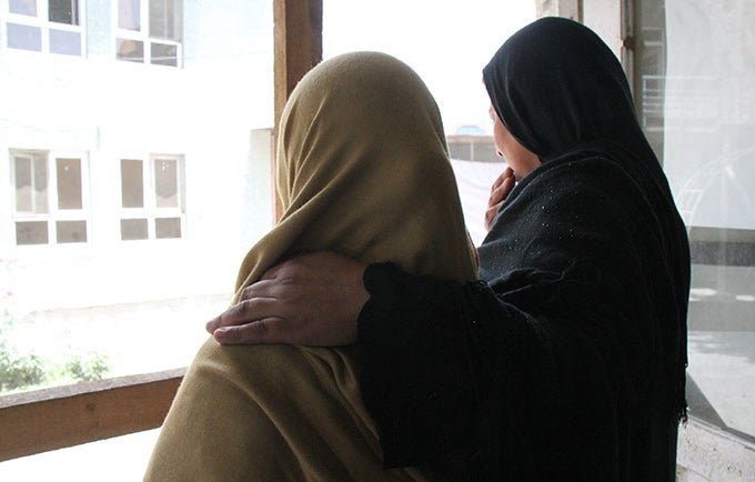 Zarmina and her mother. Some members of their family have blamed Zarmina for the abduction, but her mother has stood by her. © UNFPA Afghanistan